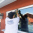 Home Maintenance Specialist installing impact windows on a home in Fort Myers, Florida.